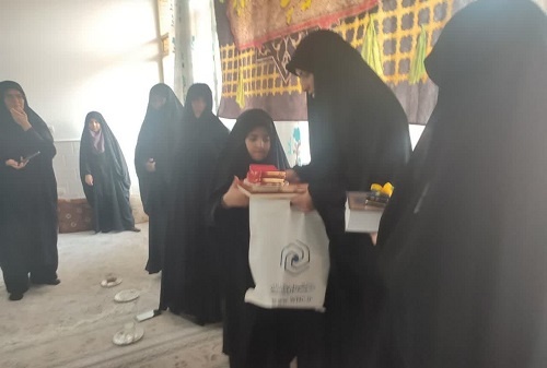 دیدار مدیر و کادر مدیریت حوزه علمیه خواهران قم با خانواده شهید میثم فتحقریب