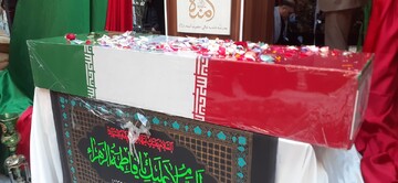 تصاویر/ مراسم تشییع و تدفین پیکر مطهر شهید گمنام در مدرسه علمیه خواهران حضرت آمنه(س) قم