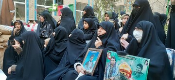 تصاویر/ مراسم تشییع و تدفین پیکر مطهر شهید گمنام در مدرسه علمیه خواهران حضرت آمنه(س) قم